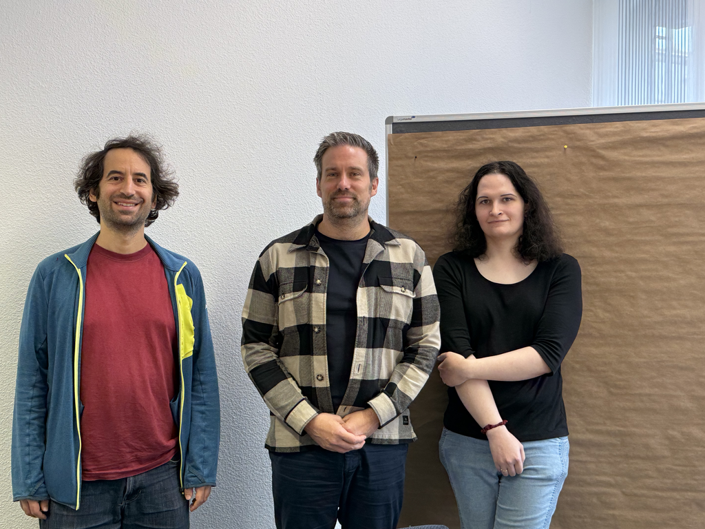 HPSC Lab members Simon, Michael and Vivienne at the 2025 SNuBIC retreat in Forsbach